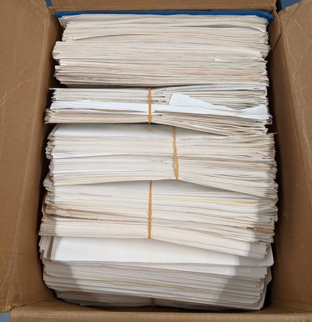 sheets of paper in a box